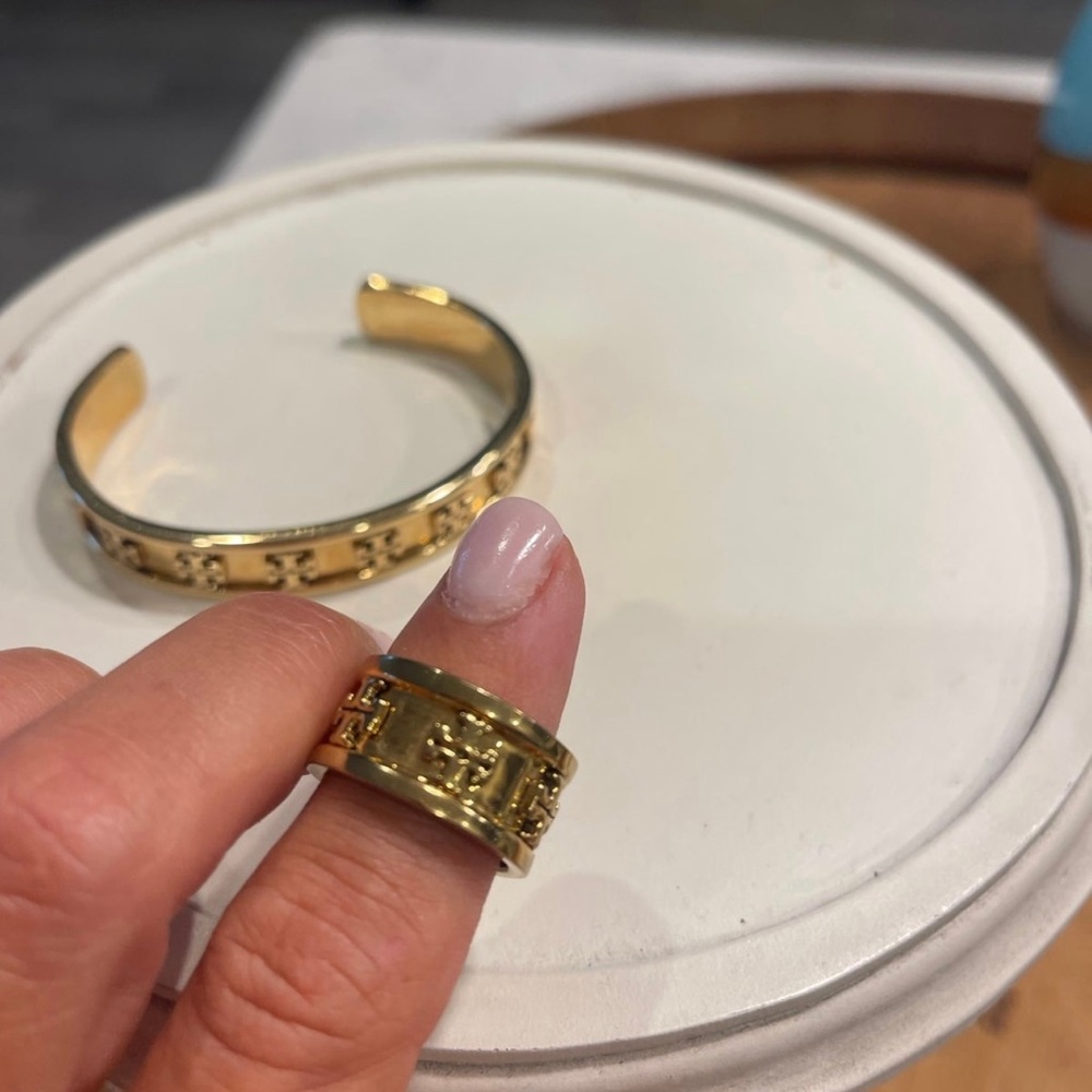 Tory burch gold raised logo ring size 6